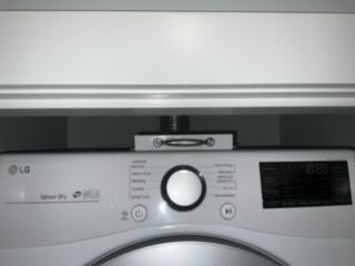 Top lint trap located above the dryer control panel